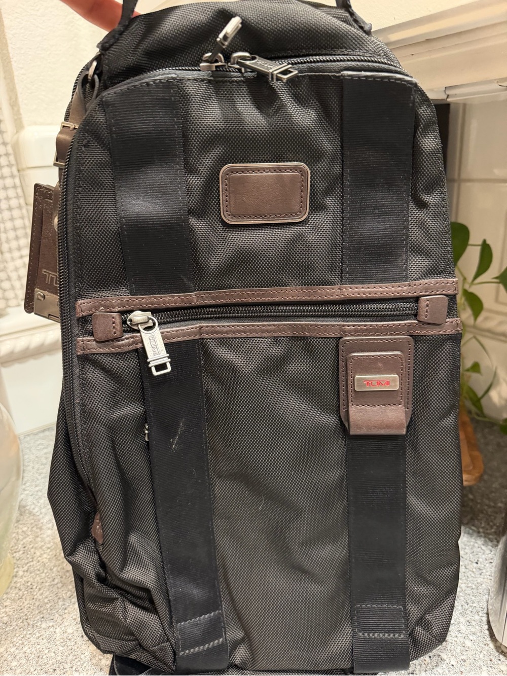 Tumi Black Backpack with Brown Trim
